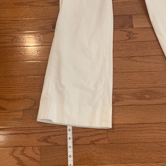 Modern boot cut, white, wide-leg pants. - Picture 2 of 12